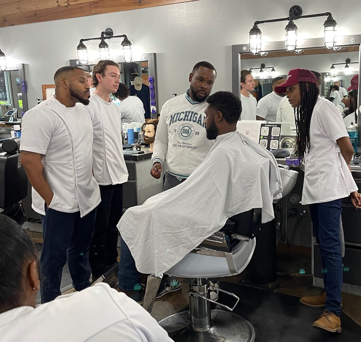 Beauty professionals learning together during Aklad Nation training
